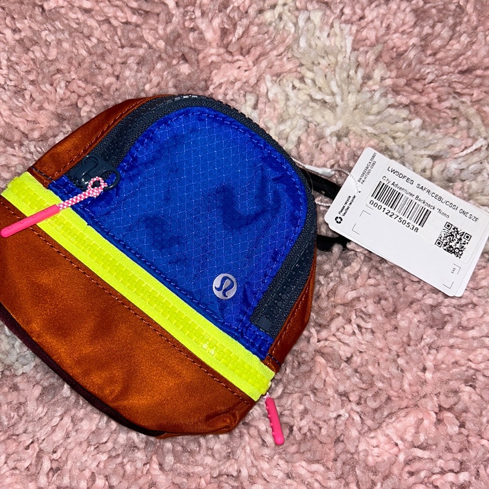 Brand new new with tags Lululemon keychain, backpack
